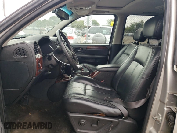 2005 GMC Envoy SLT with VIN 1GKDT13S252202866, listed as a Copart auction lot 70181524 with 169,603 mi miles and Salvage Title. Bid and sale history available at carsss.com. Image 7.