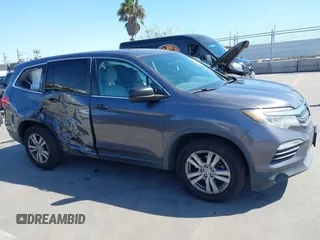 2016 Honda Pilot LX with VIN 5FNYF5H1XGB032851, listed as a IAAI auction lot 41998989 with 68,882 mi miles and . Bid and sale history available at DreamBid. Image 13.