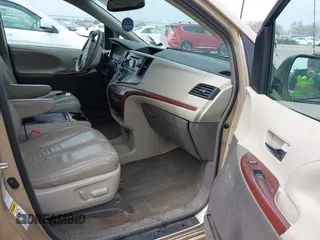 2013 Toyota Sienna XLE with VIN 5TDDK3DC4DS055796, listed as a IAAI auction lot 41993530 with 256,735 mi miles and . Bid and sale history available at DreamBid. Image 5.