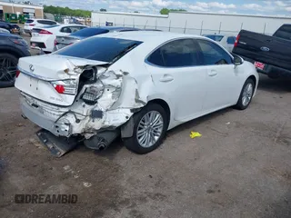 2014 Lexus ES 330 with VIN JTHBK1GG0E2137347, listed as a IAAI auction lot 42128381 with 96,612 mi miles and . Bid and sale history available at DreamBid. Image 4.