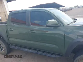 2021 Toyota Tacoma SR z VIN 3TYCZ5AN2MT049069, wystawiony jako IAAI lot #42116964 z przebiegiem 96 275 mil mil oraz . Historia ofert i sprzedaży dostępna na DreamBid. Obrazek 13.