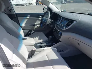 2016 Hyundai Tucson SE with VIN KM8J3CA48GU087840, listed as a IAAI auction lot 41855450 with 106,524 mi miles. Bid and sale history available at carsss.com. Image 5.