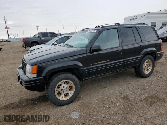 1997 Jeep Grand Cherokee Limited z VIN 1J4GZ78Y8VC586034, wystawiony jako Copart lot #58061705 z przebiegiem 244 355 mil mil oraz Czysty tytuł • Clean title. Historia ofert i sprzedaży dostępna na DreamBid. Obrazek 1.