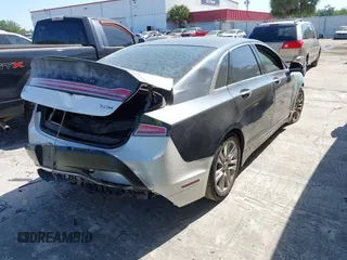 2014 Lincoln MKZ with VIN 3LN6L2GK9ER818561, listed as a IAAI auction lot 42063387 with 143,803 mi miles. Bid and sale history available at carsss.com. Image 4.