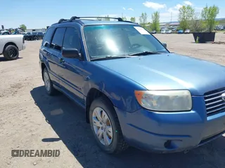 2007 Subaru Forester X z VIN JF1SG63627G718079, wystawiony jako IAAI lot #42290134 z przebiegiem 303 089 mil mil oraz . Historia ofert i sprzedaży dostępna na DreamBid. Obrazek 1.