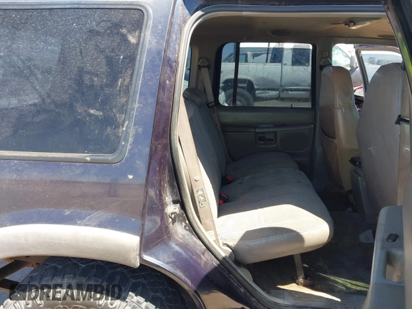 1999 Ford Explorer z VIN 1FMZU32X6XZA93597, wystawiony jako IAAI lot #42138855 z przebiegiem 190 449 mil mil oraz . Historia ofert i sprzedaży dostępna na DreamBid. Obrazek 8.