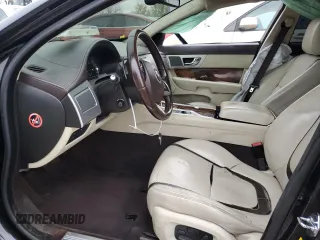 2015 Jaguar XF V6 Portfolio with VIN SAJWA0F78F8U87018, listed as a Copart auction lot 79106944 with 108,752 mi miles and Salvage Title. Bid and sale history available at carsss.com. Image 7.