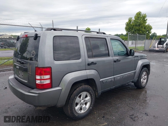 2012 Jeep Liberty Sport with VIN 1C4PJMAK2CW118636, listed as a IAAI auction lot 42646591 with 170,607 mi miles and . Bid and sale history available at DreamBid. Image 4.