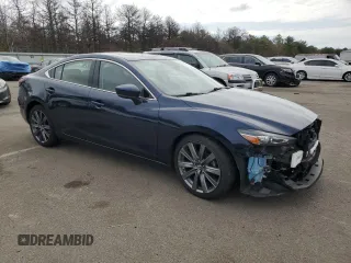 2018 Mazda 6 Grand Touring with VIN JM1GL1TY6J1323672, listed as a Copart auction lot 52700165 with 34,005 mi miles and Salvage Title. Bid and sale history available at DreamBid. Image 4.