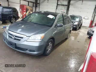2007 Honda Odyssey EX with VIN 5FNRL38427B052619, listed as a IAAI auction lot 41727004 with 213,300 mi miles. Bid and sale history available at carsss.com. Image 2.