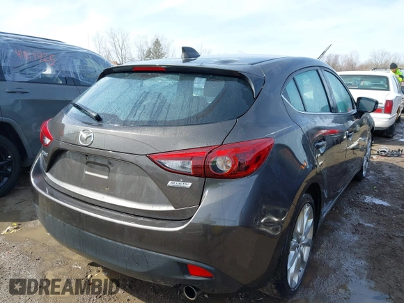 2014 Mazda 3 S Grand Touring with VIN JM1BM1M39E1149581, listed as a IAAI auction lot 41813917 with 143,019 mi miles and . Bid and sale history available at DreamBid. Image 4.