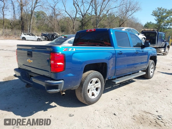 2018 Chevrolet Silverado 1500 LT with VIN 3GCUKREC9JG211391, listed as a IAAI auction lot 41710886 with 113,989 mi miles. Bid and sale history available at carsss.com. Image 4.