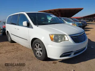 2011 Chrysler Town & Country Touring with VIN 2A4RR5DG3BR650252, listed as a IAAI auction lot 41478996 with 150,570 mi miles. Bid and sale history available at carsss.com. Image 1.