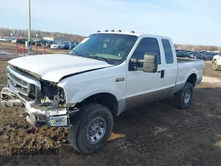 2001 Ford Super Duty F-250 XL with VIN 1FTNX21F91EA15553, listed as a IAAI auction lot 41759332 with 234,023 mi miles. Bid and sale history available at carsss.com. Image 2.