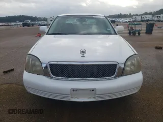 2002 Cadillac DeVille z VIN 1G6KD54Y42U247207, wystawiony jako Copart lot #77691724 z przebiegiem 71 514 mil mil oraz Szkody całkowita. Historia ofert i sprzedaży dostępna na DreamBid. Obrazek 5.