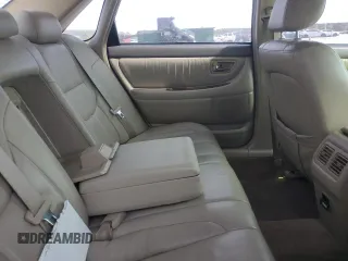 2001 Toyota Avalon XL z VIN 4T1BF28B41U191680, wystawiony jako Copart lot #53956735 z przebiegiem 177 149 mil mil oraz Szkody całkowita. Historia ofert i sprzedaży dostępna na DreamBid. Obrazek 10.