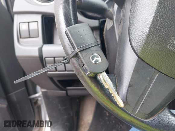 2012 Mazda 5 Sport with VIN JM1CW2BL0C0111151, listed as a IAAI auction lot 42359887 with 158,986 mi miles and . Bid and sale history available at DreamBid. Image 11.
