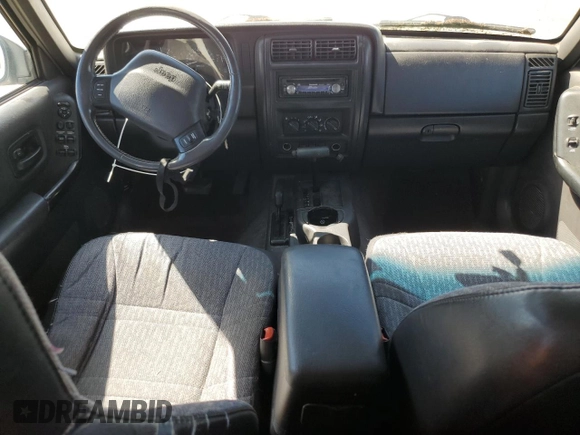 2000 Jeep Cherokee with VIN 1J4FF48S6YL169224, listed as a Copart auction lot 64411145 with 237,553 mi miles and Clean title. Bid and sale history available at DreamBid. Image 8.