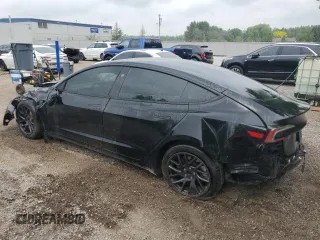 2025 Tesla Model 3 Long Range with VIN 5YJ3E1EB6SF923974, listed as a Copart auction lot 57059495 with 9,108 mi miles and Salvage title. Bid and sale history available at DreamBid. Image 2.