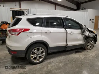 2014 Ford Escape Titanium with VIN 1FMCU9JX1EUD40870, listed as a Copart auction lot 51337695 with 163,210 mi miles and Salvage Title. Bid and sale history available at DreamBid. Image 3.