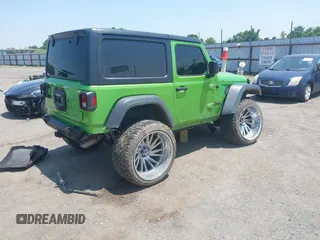 2018 Jeep Wrangler Sport with VIN 1C4GJXAG1JW271695, listed as a IAAI auction lot 42472603 with 105,460 mi miles and . Bid and sale history available at DreamBid. Image 4.