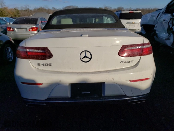 2018 Mercedes-Benz E-Class E 400 with VIN WDD1K6GB0JF038955, listed as a Copart auction lot 87763285 with 55,576 mi miles and Salvage Title. Bid and sale history available at carsss.com. Image 6.