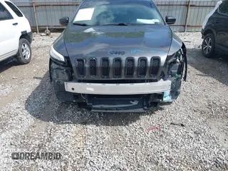 2016 Jeep Cherokee Sport with VIN 1C4PJLAB2GW351500, listed as a IAAI auction lot 42210874 with 148,165 mi miles and . Bid and sale history available at DreamBid. Image 6.