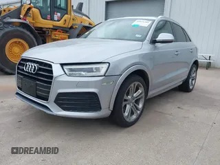 2018 Audi Q3 Premium Plus z VIN WA1JCCFS8JR023281, wystawiony jako IAAI lot #42071289 z przebiegiem 71 335 mil mil oraz . Historia ofert i sprzedaży dostępna na DreamBid. Obrazek 2.