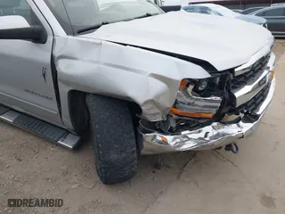 2018 Chevrolet Silverado 1500 LT with VIN 1GCVKREH8JZ267659, listed as a IAAI auction lot 41279618 with 143,310 mi miles. Bid and sale history available at carsss.com. Image 6.