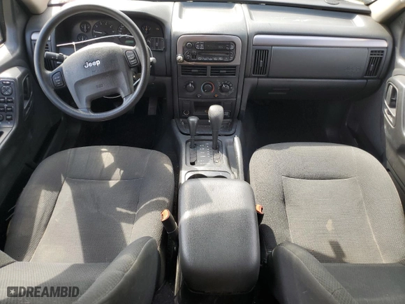 2004 Jeep Grand Cherokee Laredo with VIN 1J4GW48S44C100529, listed as a Copart auction lot 51022405 with 169,966 mi miles and Clean Title. Bid and sale history available at carsss.com. Image 8.
