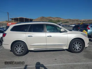 2015 Buick Enclave Leather with VIN 5GAKRBKD7FJ222825, listed as a IAAI auction lot 41987918 with 176,616 mi miles and . Bid and sale history available at DreamBid. Image 13.