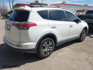 2017 Toyota RAV4 LE with VIN JTMZFREV0HJ116626, listed as a IAAI auction lot 41809294 with 110,114 mi miles. Bid and sale history available at carsss.com. Image 4.