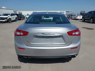 2014 Maserati Ghibli S Q4 with VIN ZAM57RTA8E1085631, listed as a IAAI auction lot 41829745 with 80,418 mi miles. Bid and sale history available at carsss.com. Image 16.