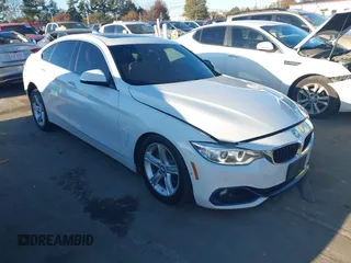 2016 BMW 4 Series 428i xDrive with VIN WBA4C9C54GG139275, listed as a IAAI auction lot 40828786 with 128,124 mi miles and . Bid and sale history available at carsss.com. Image 1.