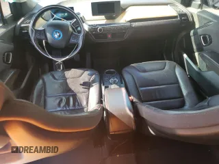 2014 BMW i3 with VIN WBY1Z4C51EV276642, listed as a Copart auction lot 52571115 with 112,178 mi miles and Salvage title. Bid and sale history available at DreamBid. Image 8.