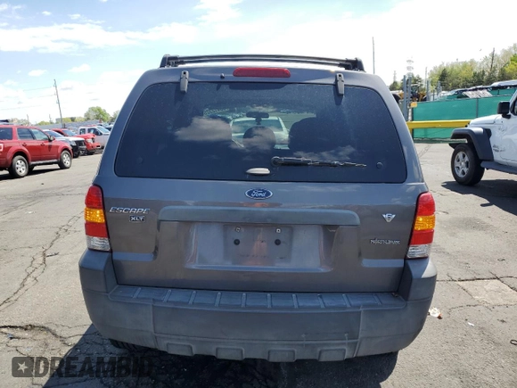 2006 Ford Escape XLT z VIN 1FMCU03186KA78489, wystawiony jako Copart lot #55412325 z przebiegiem 144 243 mil mil oraz Szkoda całkowita • Salvage title. Historia ofert i sprzedaży dostępna na DreamBid. Obrazek 6.