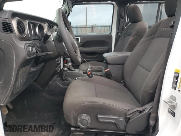 2023 Jeep Gladiator Overland z VIN 1C6HJTFG6PL516742, wystawiony jako Copart lot #65762465 z przebiegiem Nie podano mil oraz Szkoda całkowita • Salvage title. Historia ofert i sprzedaży dostępna na DreamBid. Obrazek 7.