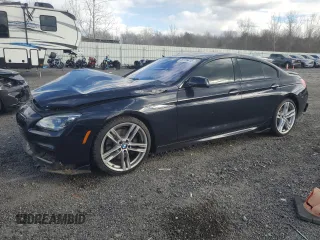 2015 BMW 6 Series 640i with VIN WBA6A0C58FD318669, listed as a Copart auction lot 50706415 with 79,538 mi miles and Clean Title. Bid and sale history available at carsss.com. Image 1.