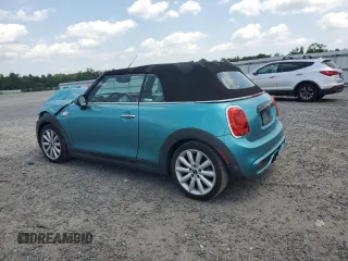 2018 MINI Convertible Cooper S with VIN WMWWG9C59J3D22587, listed as a Copart auction lot 61673415 with 34,935 mi miles and Salvage title. Bid and sale history available at DreamBid. Image 2.