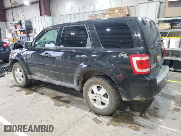 2011 Ford Escape XLS z VIN 1FMCU9C77BKC43662, wystawiony jako Copart lot #51779335 z przebiegiem 104 548 mil mil oraz Szkoda całkowita • Salvage title. Historia ofert i sprzedaży dostępna na DreamBid. Obrazek 2.
