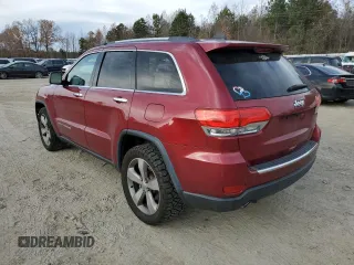 2014 Jeep Grand Cherokee Limited with VIN 1C4RJEBT7EC147432, listed as a Copart auction lot 83339654 with 145,017 mi miles and Salvage Title. Bid and sale history available at DreamBid. Image 2.
