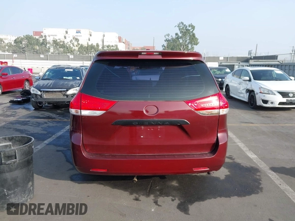 2011 Toyota Sienna with VIN 5TDZK3DCXBS157316, listed as a IAAI auction lot 41240896 with 117,437 mi miles. Bid and sale history available at carsss.com. Image 16.