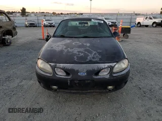 1998 Ford Escort z VIN 3FALP1131WR101490, wystawiony jako Copart lot #74065584 z przebiegiem 144 659 mil mil oraz Szkoda całkowita • Salvage title. Historia ofert i sprzedaży dostępna na DreamBid. Obrazek 5.
