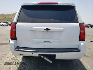 2019 Chevrolet Suburban LT with VIN 1GNSCHKCXKR207233, listed as a Copart auction lot 55410464 with 107,500 mi miles and Salvage Title. Bid and sale history available at DreamBid. Image 6.
