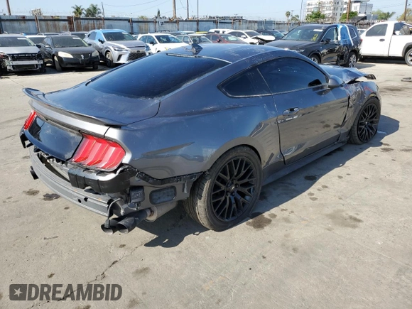 2021 Ford Mustang GT z VIN 1FA6P8CF9M5103856, wystawiony jako Copart lot #56322045 z przebiegiem 27 499 mil mil oraz Szkody całkowita. Historia ofert i sprzedaży dostępna na DreamBid. Obrazek 3.