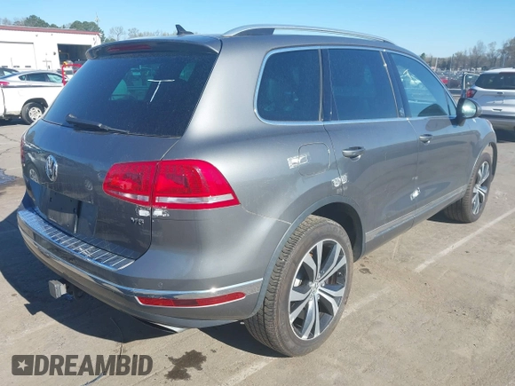 2017 Volkswagen Touareg Wolfsburg Edition с VIN WVGRF7BP1HD004308, выставлен на аукционе IAAI как лот 41860019 с пробегом 74 044 миль миль и . История ставок и продаж доступна на DreamBid. Изображение 4.