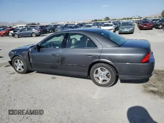 2000 Lincoln LS with VIN 1LNHM87A6YY857193, listed as a Copart auction lot 63065804 with 91,542 mi miles and Salvage Title. Bid and sale history available at carsss.com. Image 2.