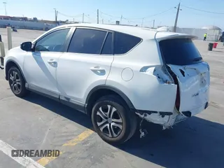 2017 Toyota RAV4 LE with VIN JTMZFREV8HJ145159, listed as a IAAI auction lot 42078884 with 103,425 mi miles and . Bid and sale history available at carsss.com. Image 3.