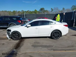 2017 Mazda Mazda6 Touring with VIN JM1GL1V54H1109471, listed as a IAAI auction lot 41694391 with 134,408 mi miles. Bid and sale history available at carsss.com. Image 14.