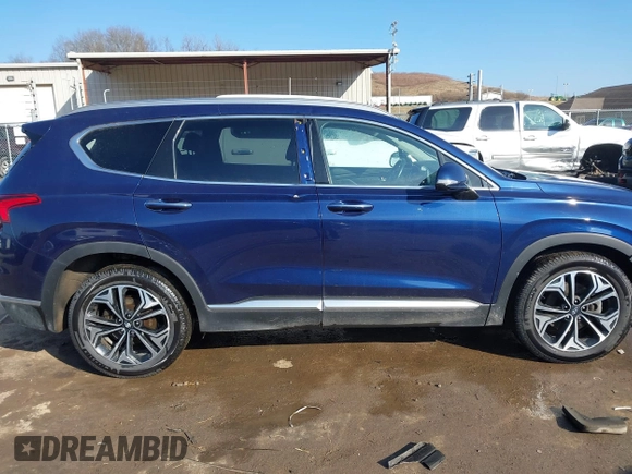 2019 Hyundai Santa Fe Ultimate with VIN 5NMS5CAA6KH117104, listed as a IAAI auction lot 41639157 with 75,507 mi miles and . Bid and sale history available at DreamBid. Image 13.